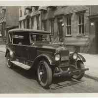 Sepia-tone photo of taxicab or car service automobile parked on unidentified street, Hoboken, n.d., probably 1927 (license plate date.)
