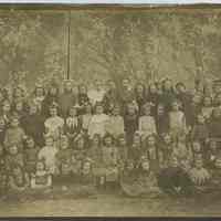 Sepia-tone group photo of Our Lady of Grace School 1st grade class with Mabel Bolles, Hoboken, April 1905.