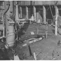 B+W photo showing damage on the main deck on unidentified vessel at the Bethlehem Steel Shipyard, Hoboken Division, no date, ca. 1940.