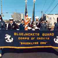 Color photo of the color guard for the 1985 Hoboken Ragamuffin Parade on Willow Avenue near 14th St., Hoboken, October, 1985.