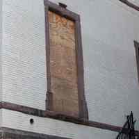          51: sealed window above stairs seen in image 50
   