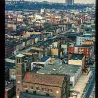 Color slide of aerial view from River & 3rd looking N. Saints Peter & Paul Catholic church at Hudson & 4th is in the foreground with Troy Towers on the Palisades