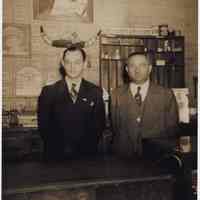          photo 2: Michael Riccio(?); Ralph Riccio inside pool hall behind counter
   