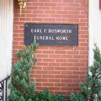 Color photo detail of metal wall sign for Earl L. Bosworth Funeral Home, 311 Willow Avenue, Hoboken, Sept., 1-5, 2001.