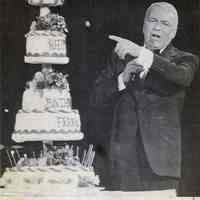 B+W wirephoto of Frank Sinatra onstage with birthday cake at Bally