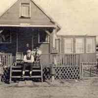Digital image of photo of three men seated on porch steps, no place (probably not Hoboken), no date, circa late 1910-1920.