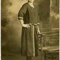 Sepia-tone photo of a woman posed in studio, Hoboken, n.d., ca. 1918-1924.