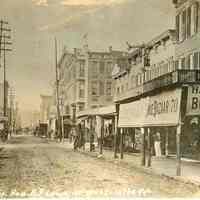 Sepia-tone photo (postcard?) of First St., Hoboken, looking west in the 1880