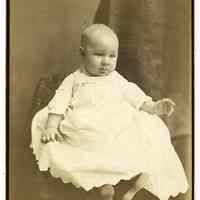 Cabinet photo of a baby posed in photographer