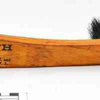 Brush, hat, imprinted handle: J. A. Heath, Hatter, 326 Washington St., Hoboken, N.J. & 114 Newark Ave., J.C., N.J. N.d., ca. 1910-1920.