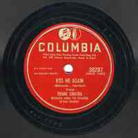 Record: "Kiss Me Again." Vocal by Frank Sinatra. Conducted by Axel Stordahl. Columbia Records. 78 rpm. No.38287 [HCO1185].