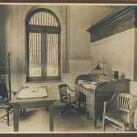 Sepia-tone photo of an office of the Hoboken Bank for Savings, Hoboken, no date, ca. 1890.