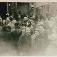 B+W candid photo of "On the Waterfront" filming in Hoboken: preparation for filming a group scene, Hoboken, no date, ca. late 1953-early 1954.