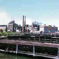 Color photo of the Maxwell House Coffee plant from a pier near 9th-10th Sts., Hoboken, [June] 1982.