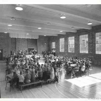 Blurry photo of children in an assembly at Lakeview Elementary School