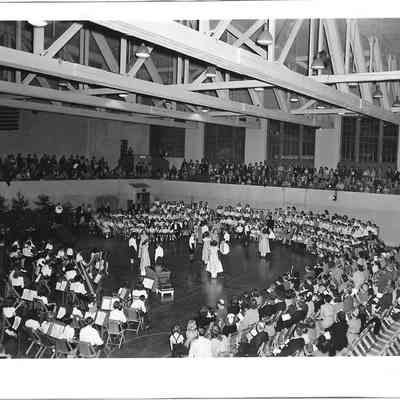 Children dancing in the middle of assembly