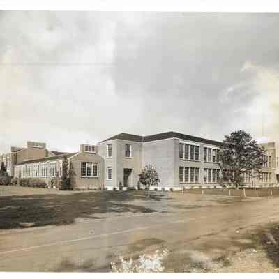 Right side of the front street view of Clover Park High School on an overcast day with minor photograph aberrations in corners