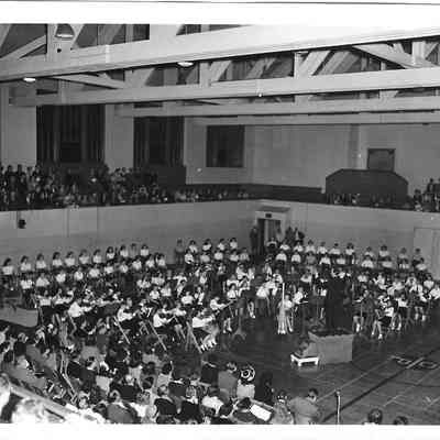 Childrens orchestra in the middle of assembly