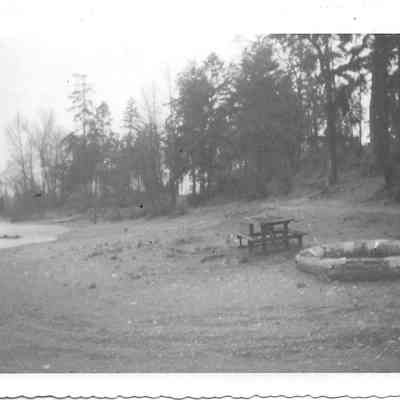 Picnic table and raft on beach at American Lake South Park Beach