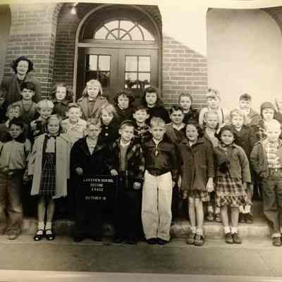 Lakeview School, Second Grade, October 18 with teacher in grey-tone coat on photo left
