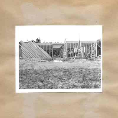 Lake City School framing with section covered in slanted panneling