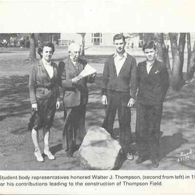 Student body representatives honored Walter J. Thompson, (second from left) in 1939 for his contributions leading to the construction of Thompson Field