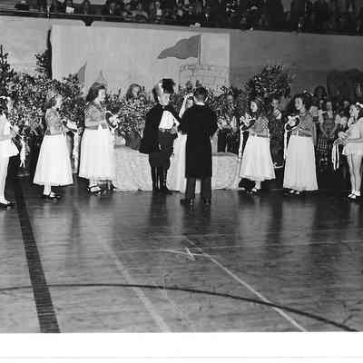 Children preforming fake wedding in the middle of Clover Park gym assembly