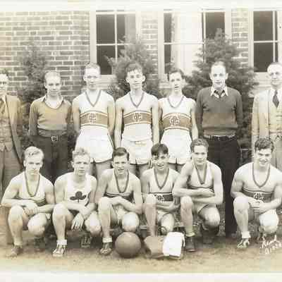 Clover Park basketball team photo in front of building