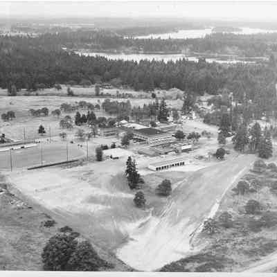 Arial shot of the field behind Clover Park High School with lakes in the background