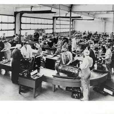 Room of women working on enginges