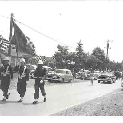 Color Guard from Ft. Lewis with pageant princesses and Queen Audrey Moe in background