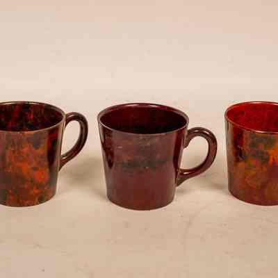 Set of three Bakelite small mugs