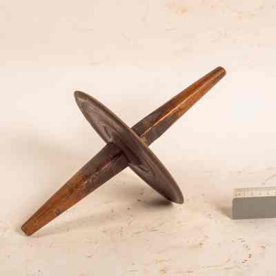 Metal disc, wooden handle