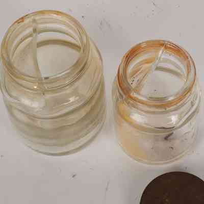 Two ink well bottles