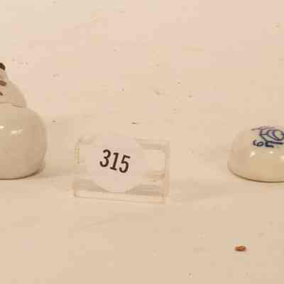 Pair of Japanese condiment pourers