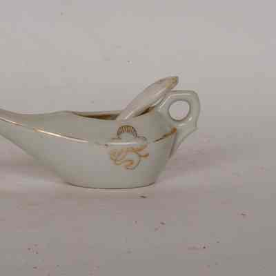 Table jug with a little white spoon