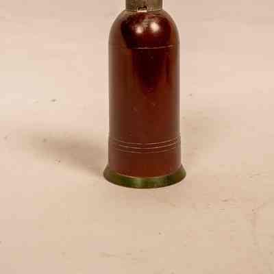 Bakelite container of "Mann Talcum Powder"