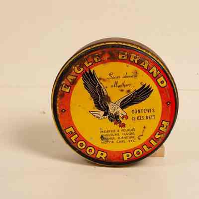 Tin of Floor Polish Eagle Brand with Eagle Motor