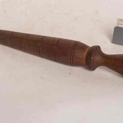 Tapered piece of wood with rings