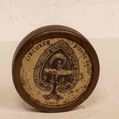 Tin of p[laying cards circular