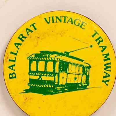 Tin badge