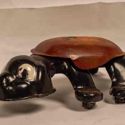 Tin walking toy