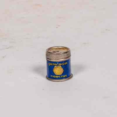 small miniature cigarette tin