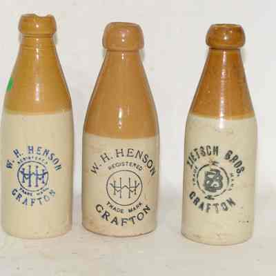 Three Ginger beer bottles