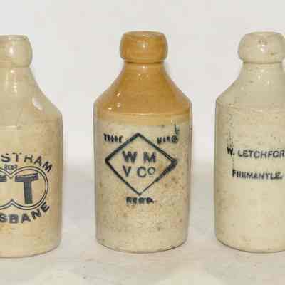 Three ginger beer bottles