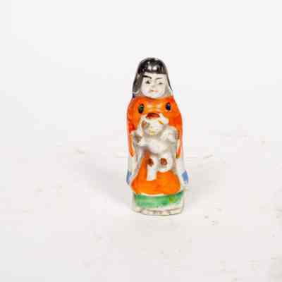 Ceramic doll