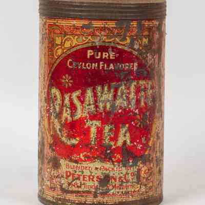 Circular tin of phoneix biscuits