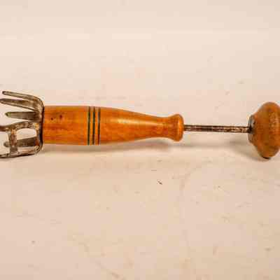 Ice pick, ice breaker, spring loaded wooden handle
