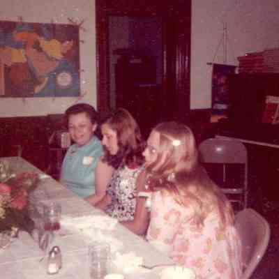 Photograph of three unidentified people, probably Carolyn Stutsman, Christa Mader, and Joanne Mason