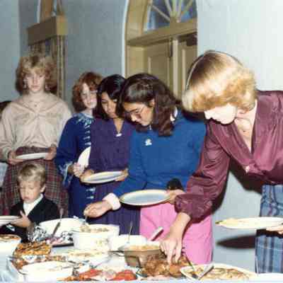 Photograph of people at AFS banquet, including Lilia Palamo, Brenda Deuberry, and Helen Smittenberg, Sept 1981